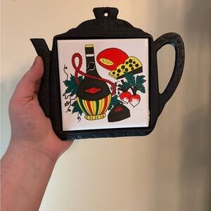 MCM vintage cast iron trivet with a ceramic tile -wine and cheese
